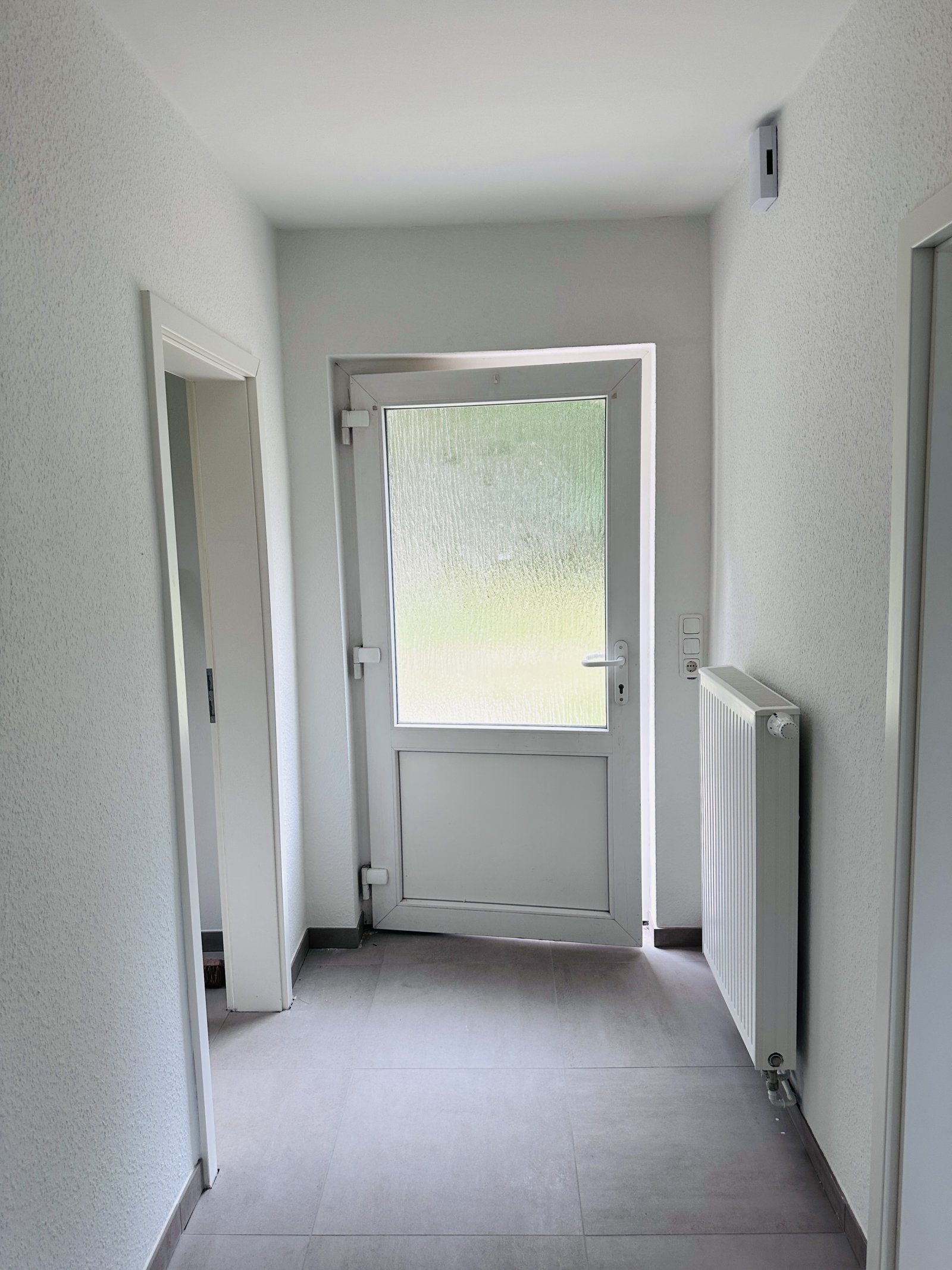 Renovierte Doppelhaushälfte mit Garten